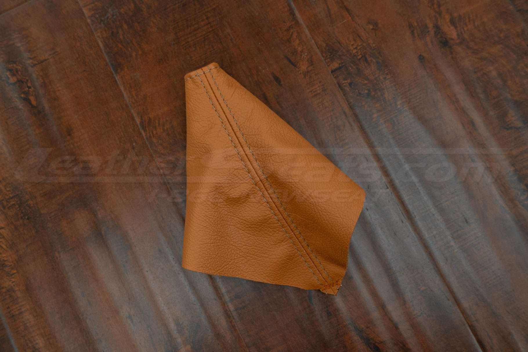 Orange Nissan 350z emergency brake cover