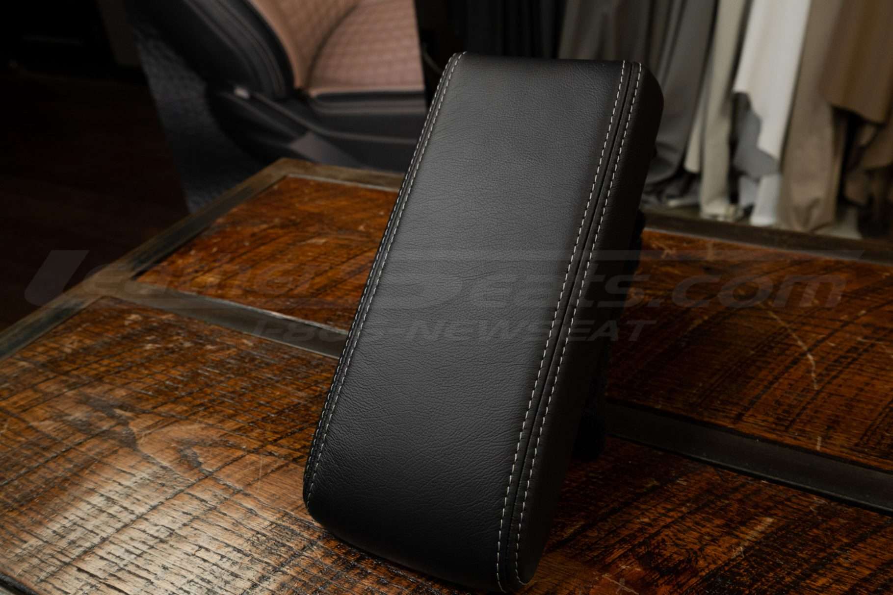 1991-1995 Acura Legend leather console lid cover in black with contrasting frost double-stitching