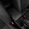 Passenger side view of Subaru Impreza WRX aftermarket center console lid cover installed