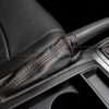 Top-down passenger view of installed aftermarket leather ebrake cover for WRX premium
