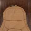 Upper section of tan mazdia miata backrest upholstery with perfrated headrest section