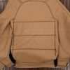 Tan insert section of leather backrest upholstery