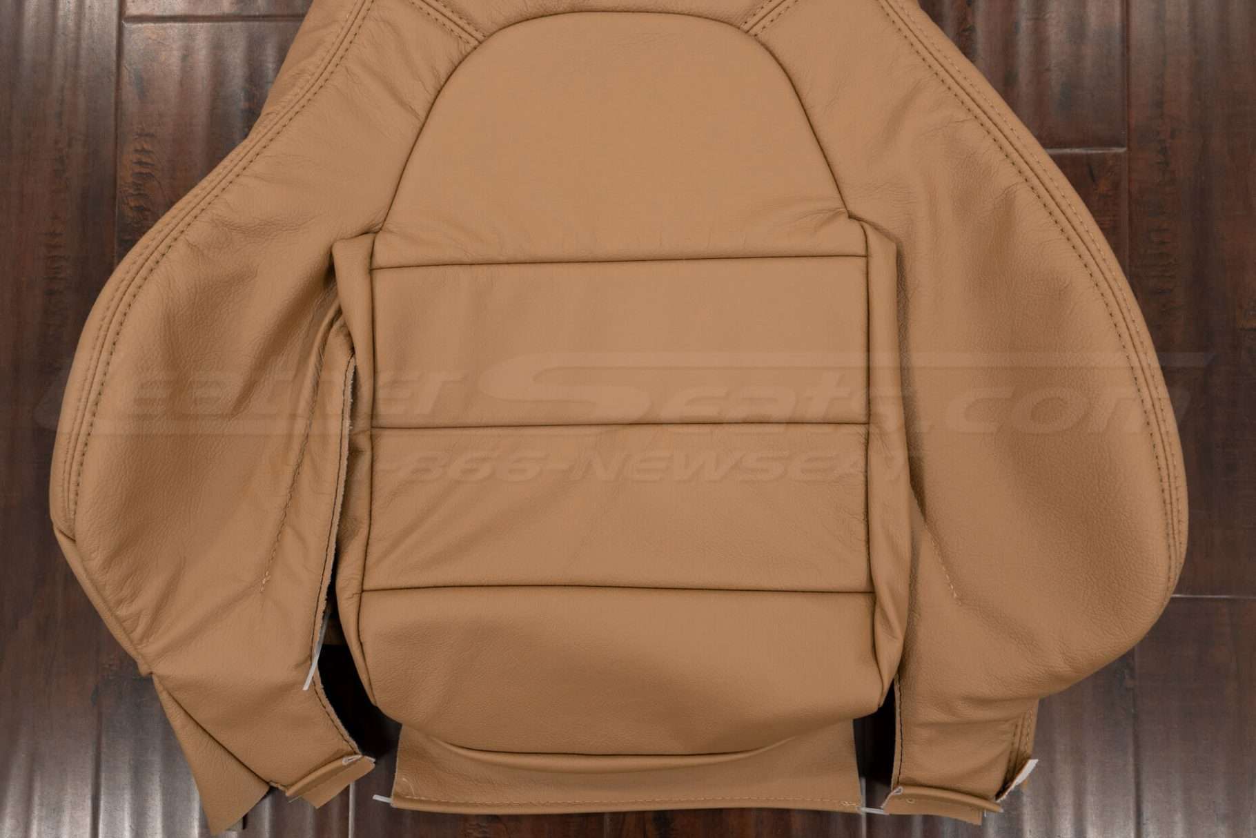 Tan insert section of leather backrest upholstery