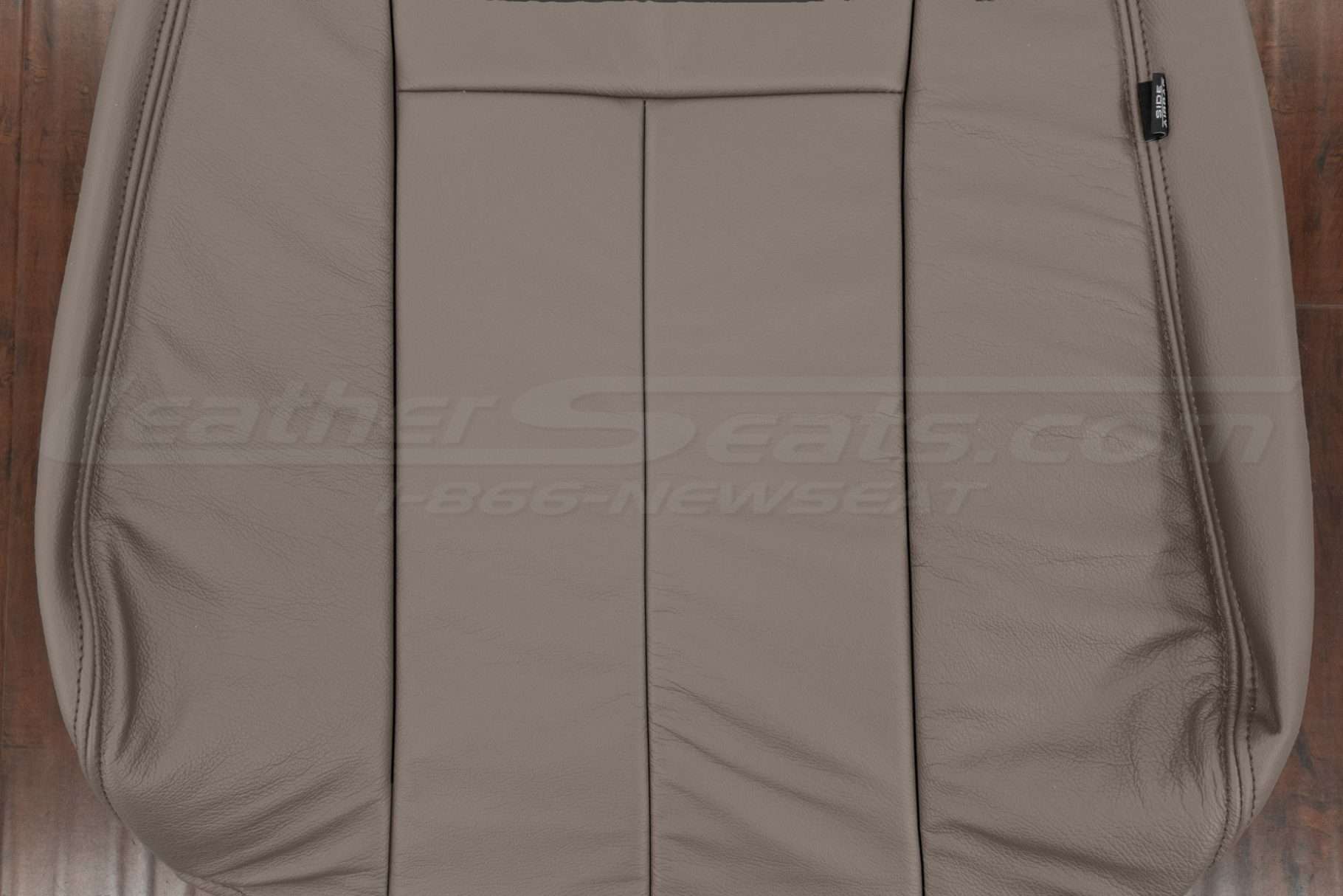 Puddy insert section of leather backrest seat cover