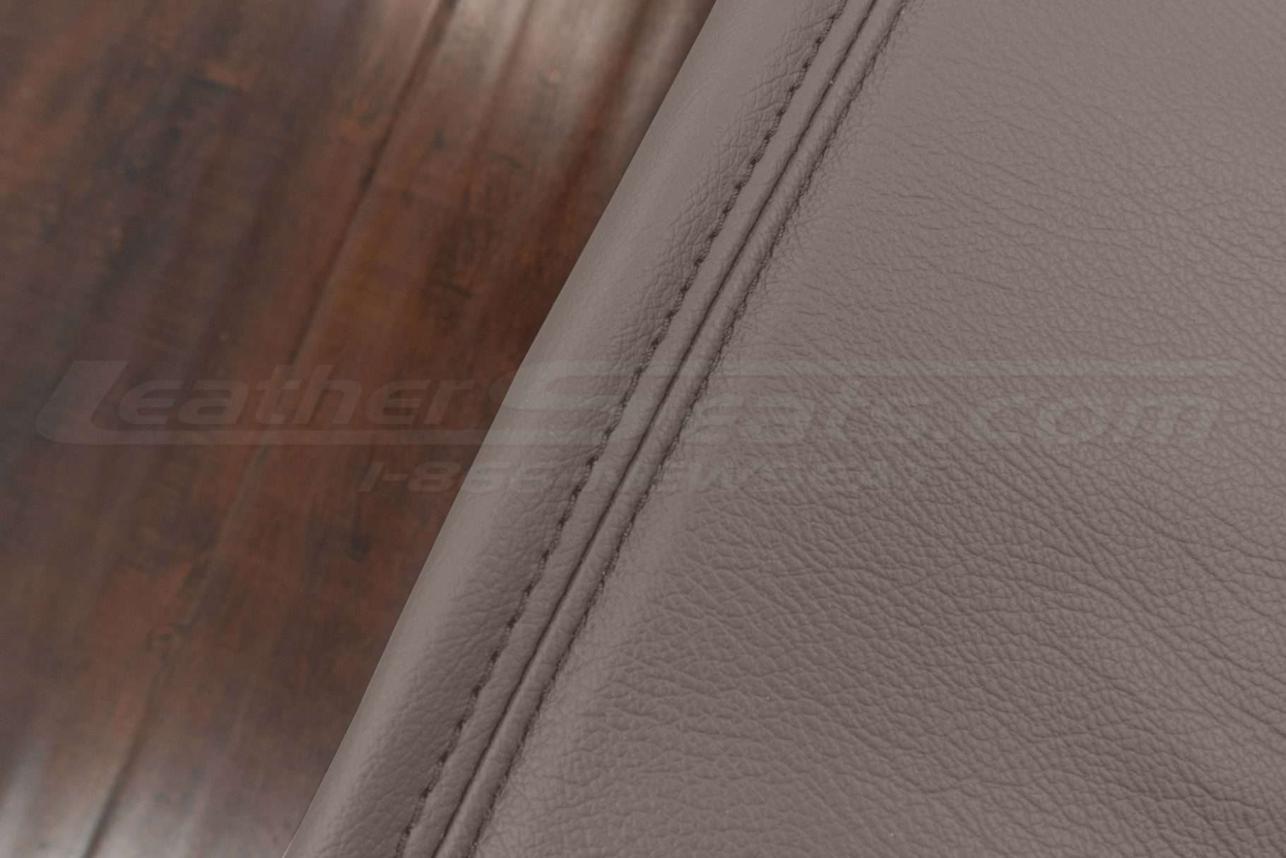 Puddy double-stitching on matching puddy leather