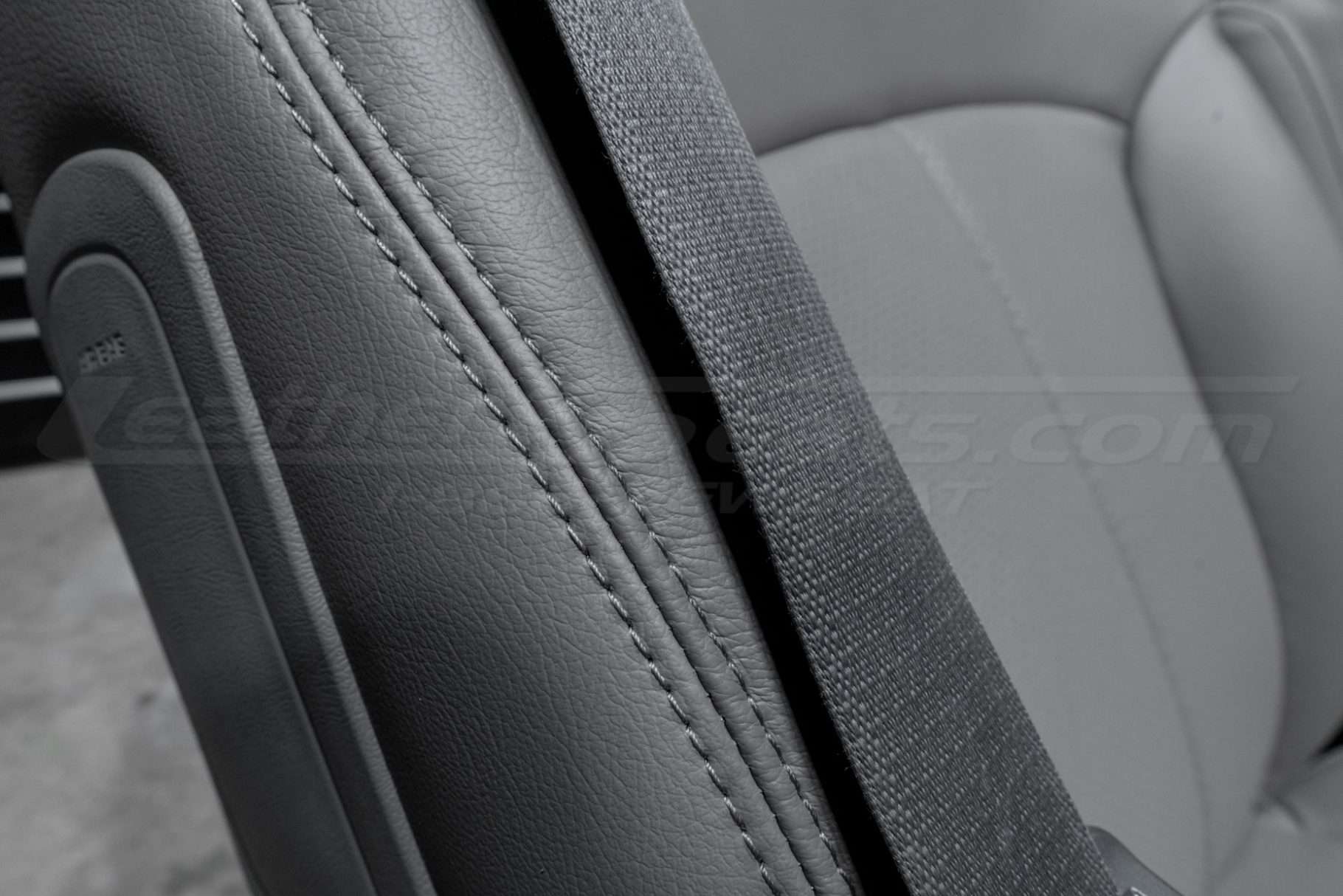 Matching smoke double-stitching on smoke leather