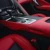 Chevrolet C7 Corvette leather driver console thigh extension in bright red nappa leather