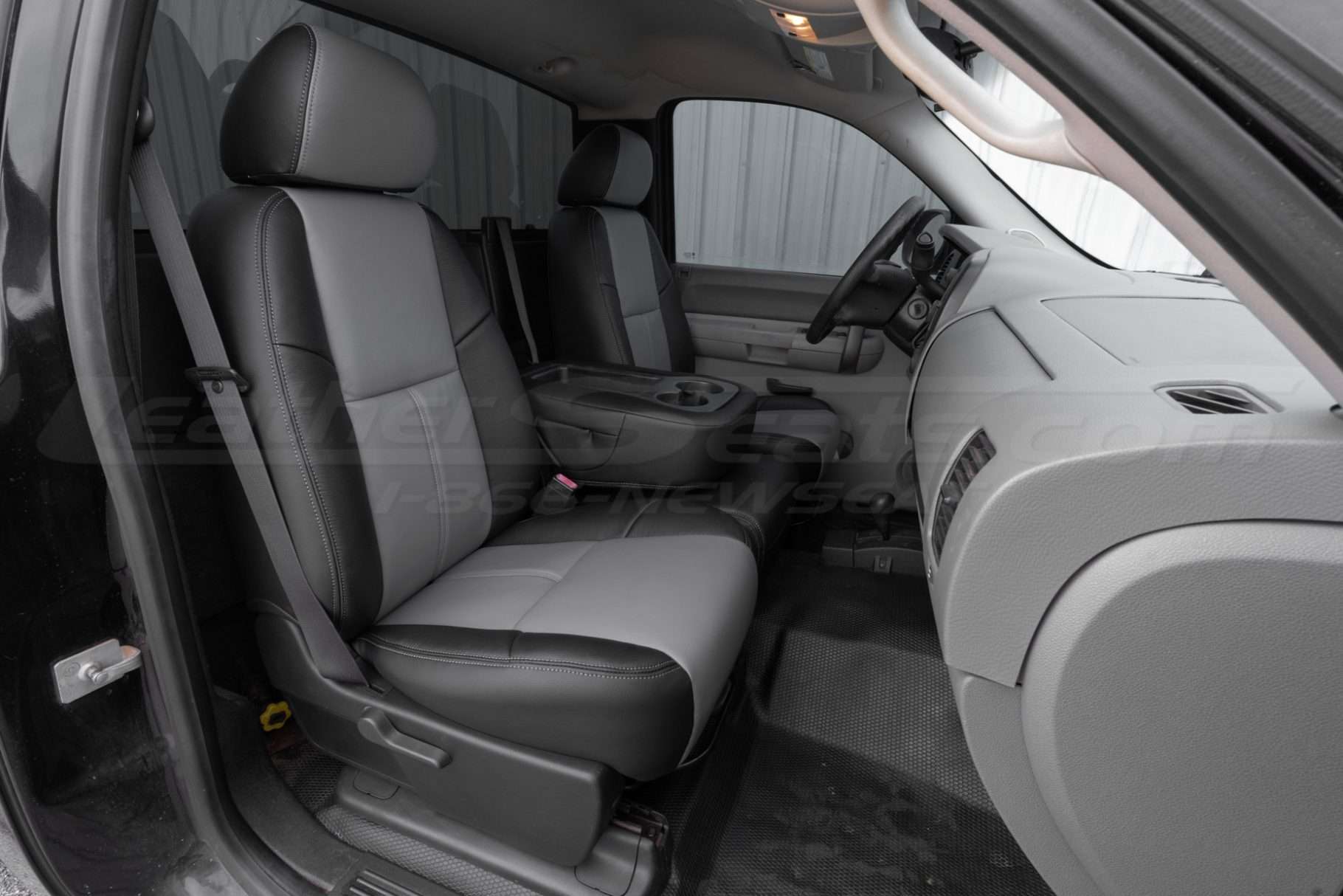 2007-2013 Chevrolet Silverado Reg cab with aftermarket installed leather seats in Black and light grey