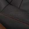 Contrast Red double-stitching on Black leather