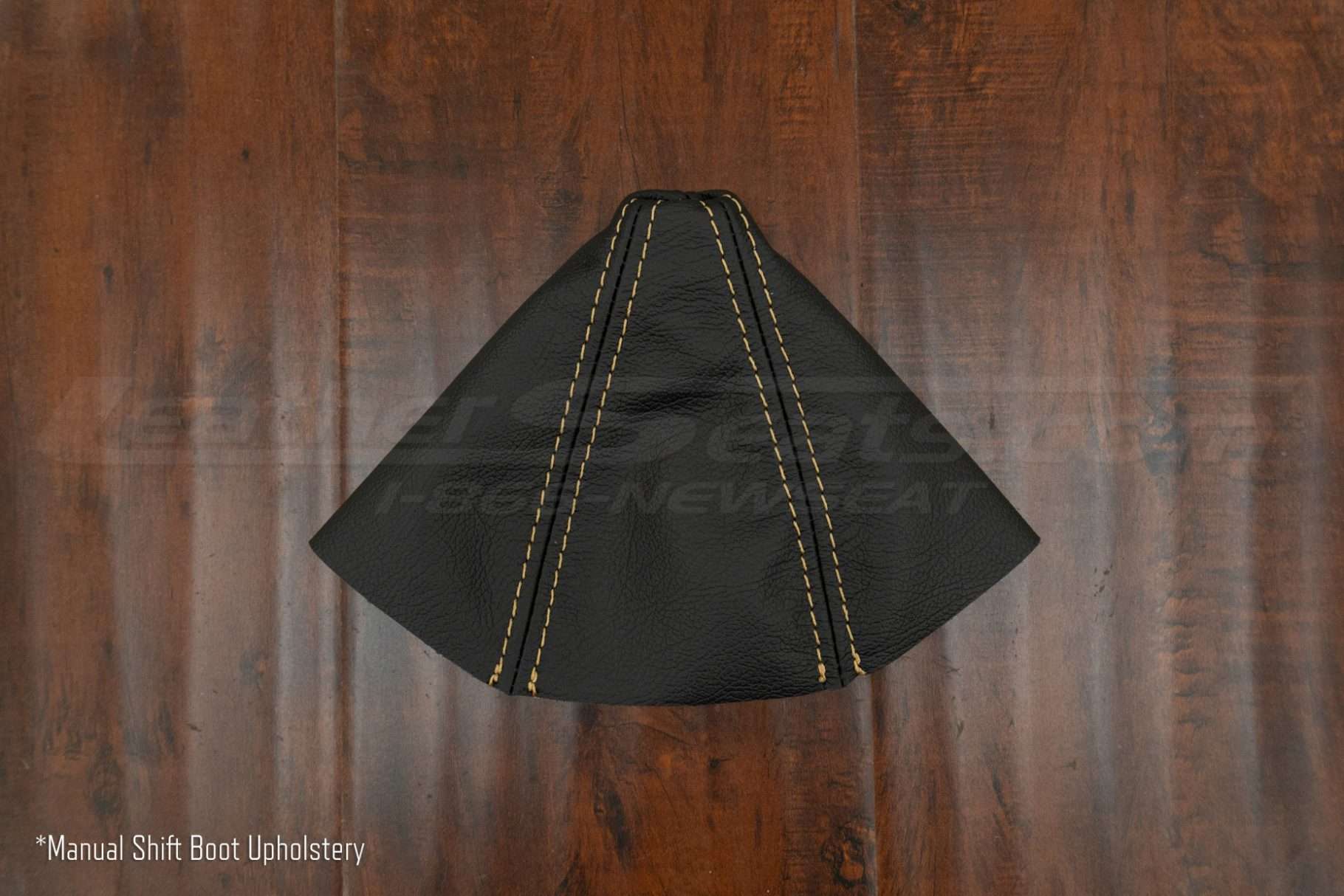 Flat lay of manual leather shifter boot upholstery for BMW Z3