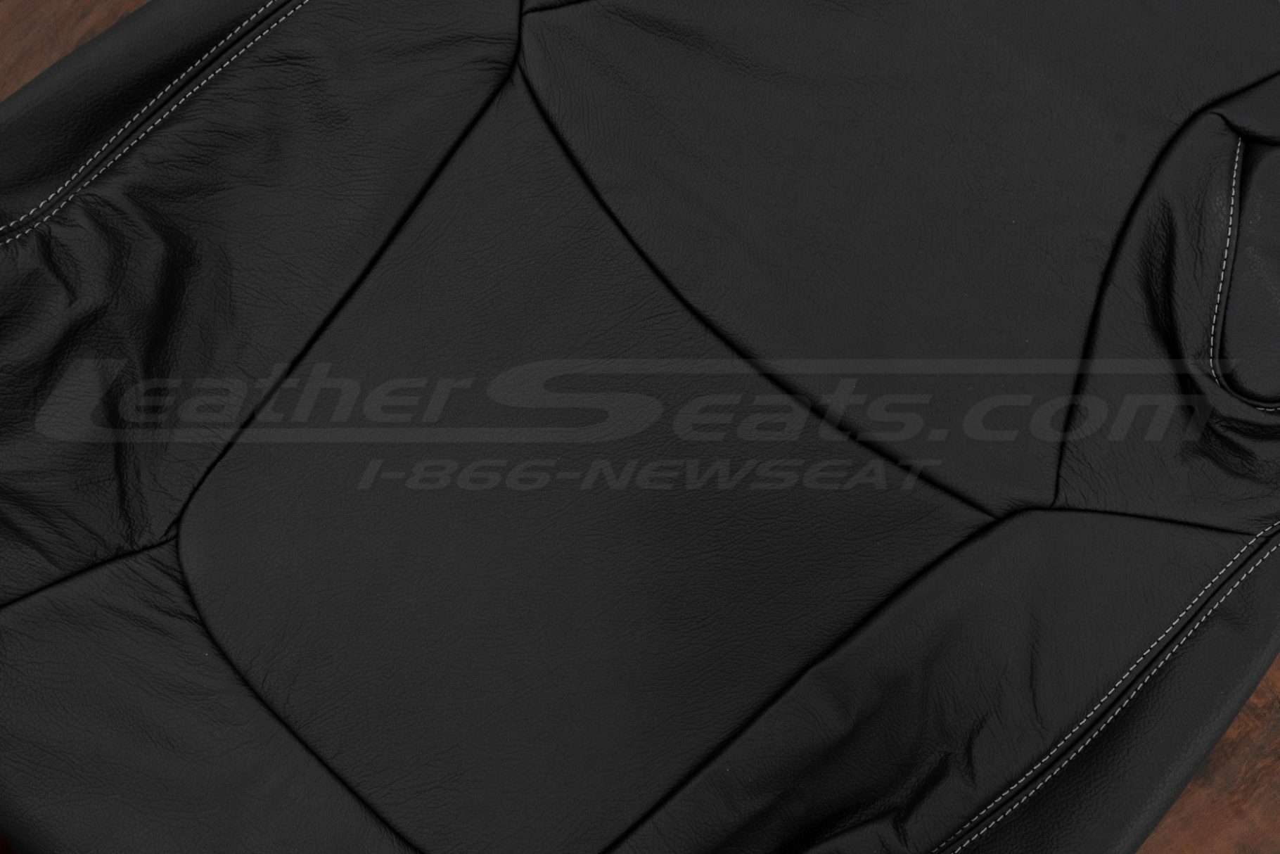 Black leather texture on corolla backrest upholstery