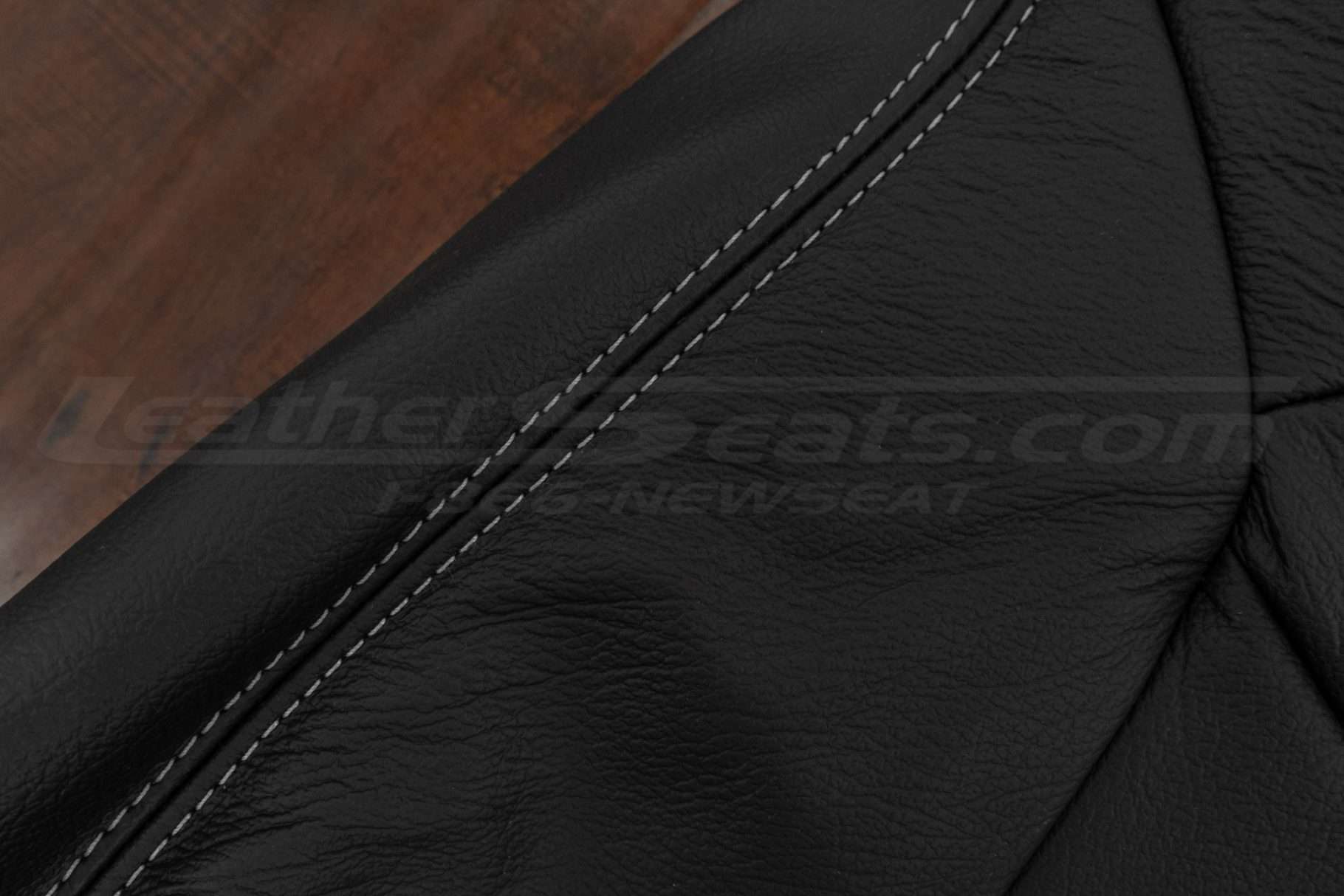Contrasting Grey stitching on Black leather