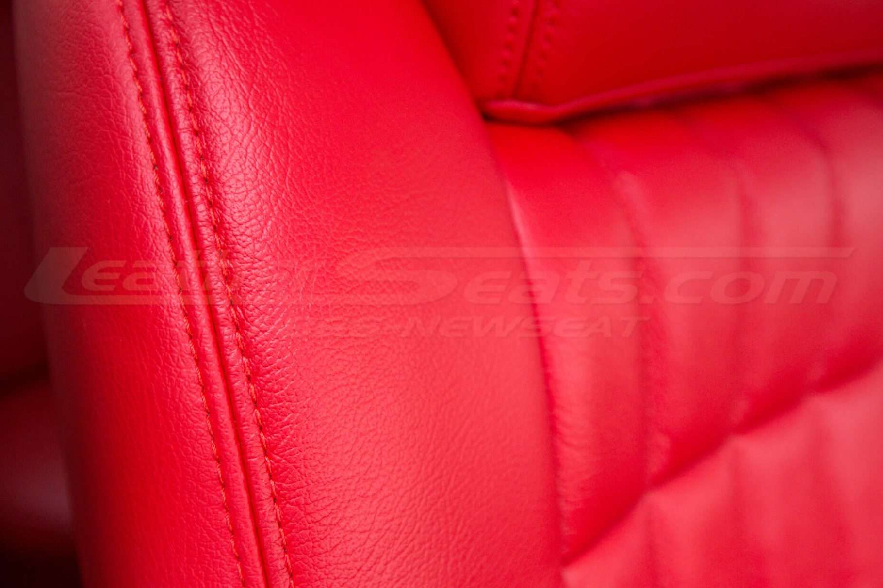 Chevy Impala SS with bright red stitching close-up
