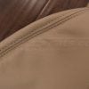 Bisque double-stitching close-up on bisque leather