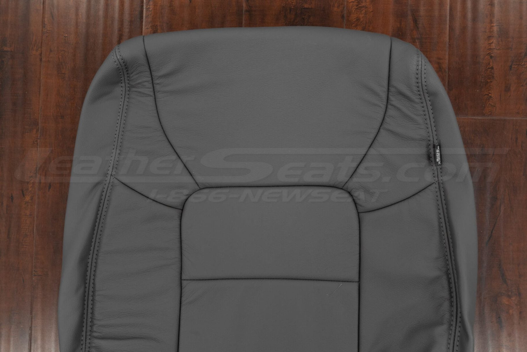 Upper section of light grey honda pilot leather backrest