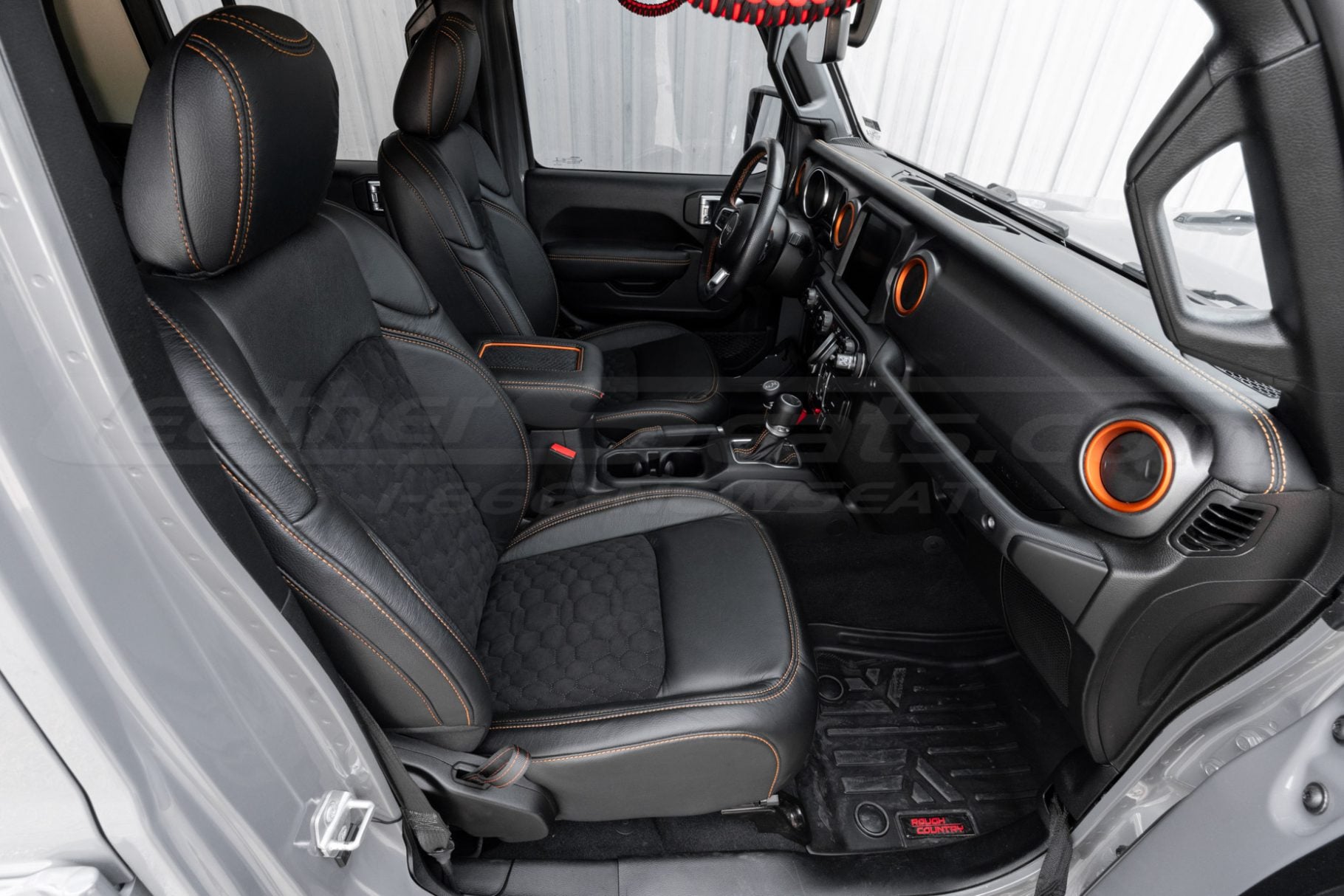 Alternative view of jeep gladiator with quilted leather seat covers in black suede - front passenger side