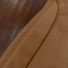 Matching Tan double-stitching on Tan leather