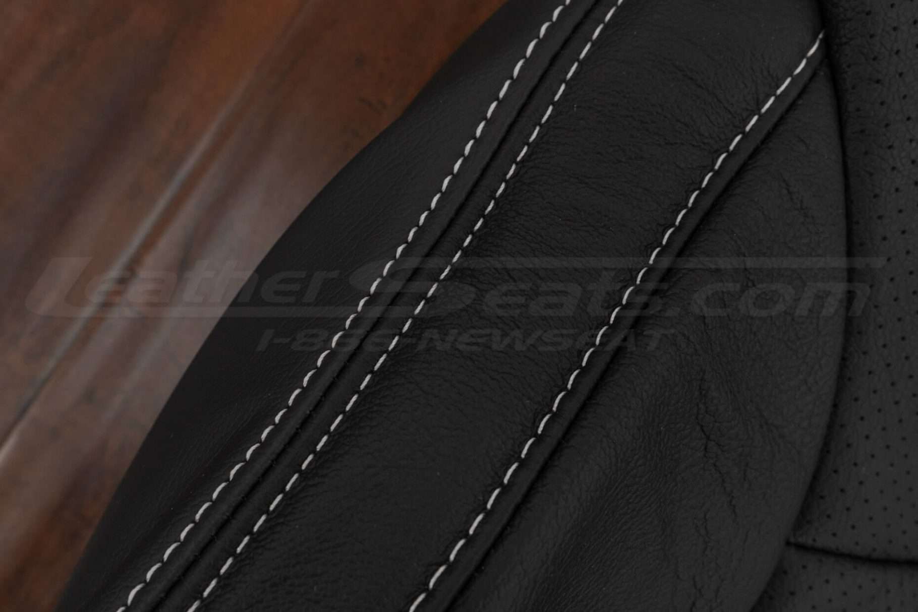 Contrasting white double-stitching on Black leather for Subaru Outback