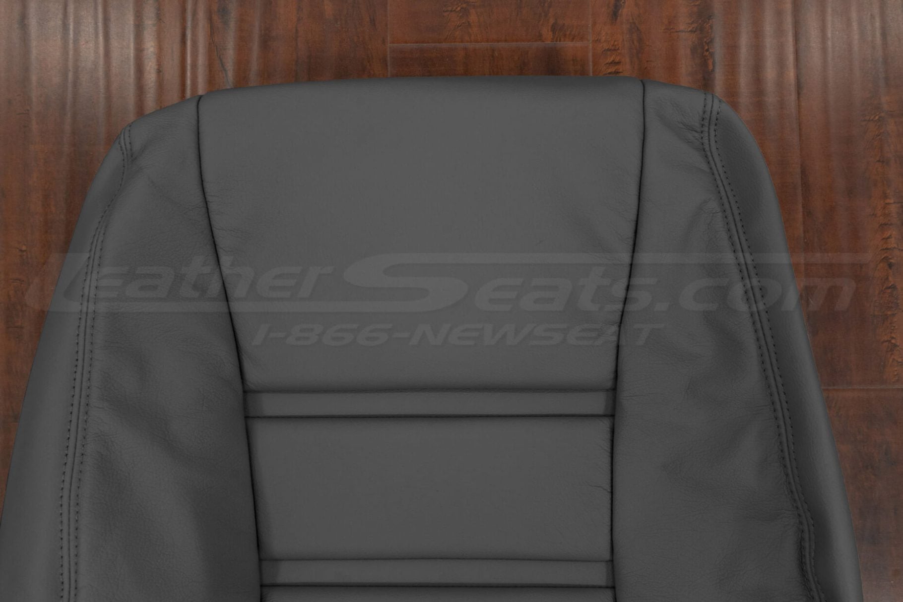 Upper section of aftermarket leather backrest upholstery