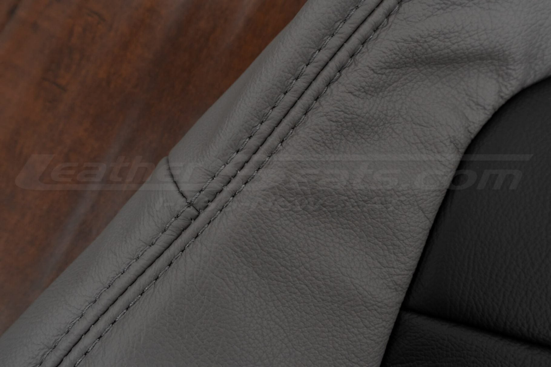 Stone double-stitching on stone leather