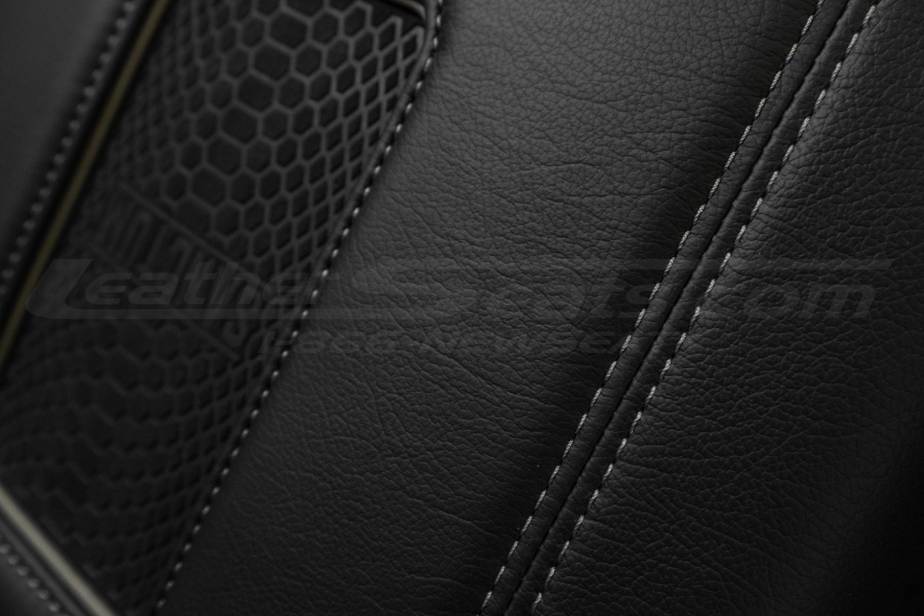 Contrast Smoke stitching on Black leather for sanctum consoles