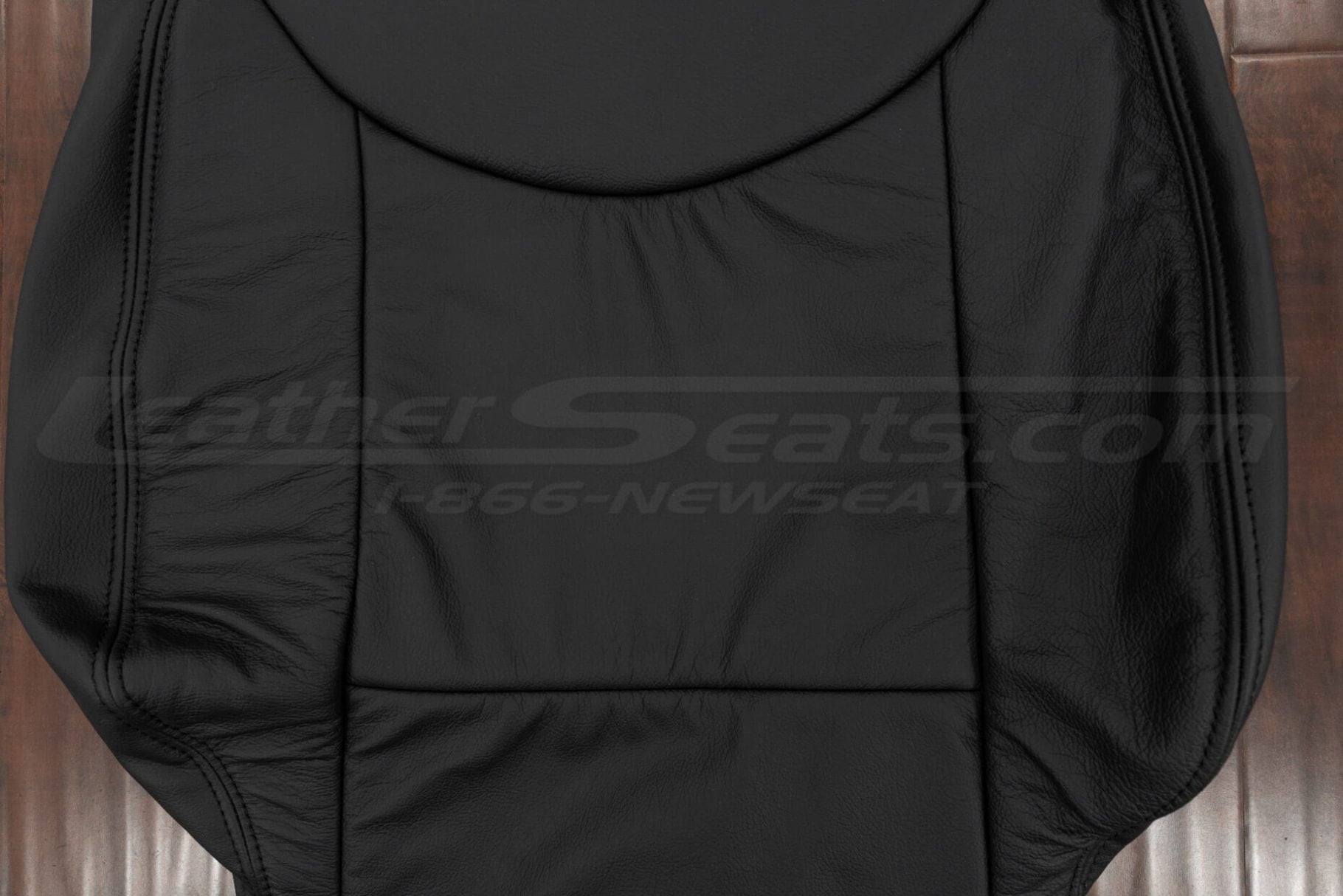 Insert section of black leather backrest upholstery