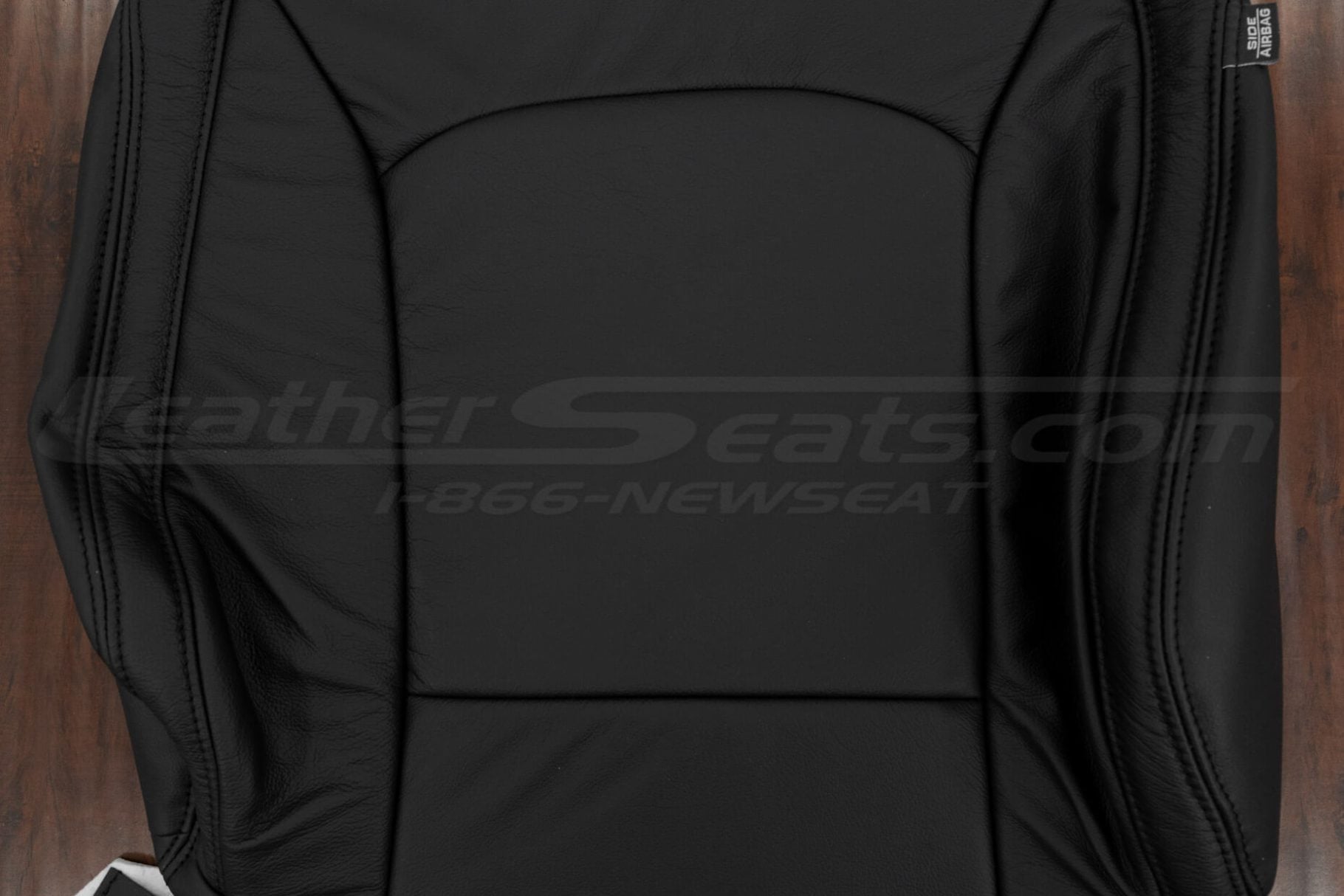 Black leather backrest section of kia soul seat