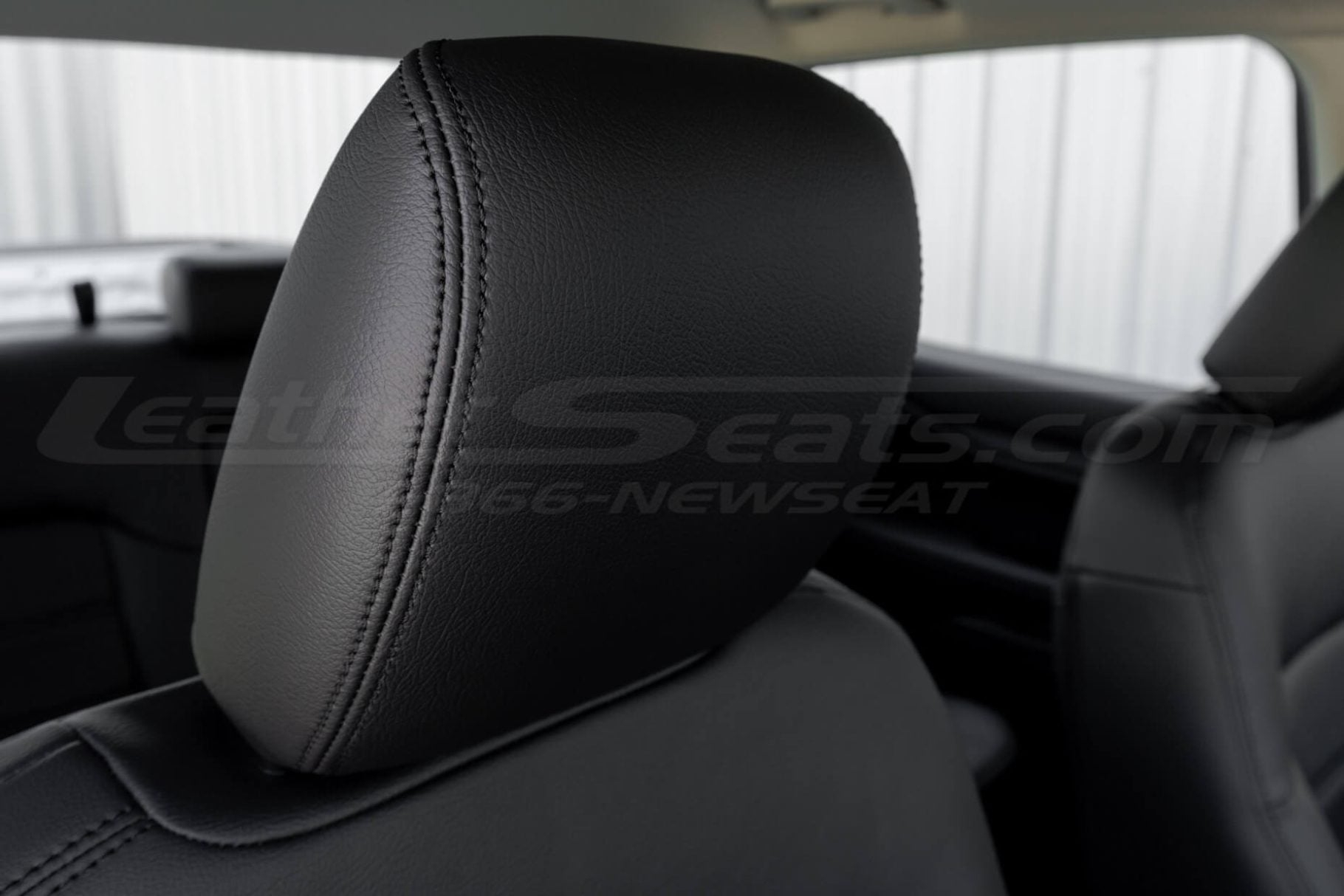 Ford Ranger black leather headrest close-up