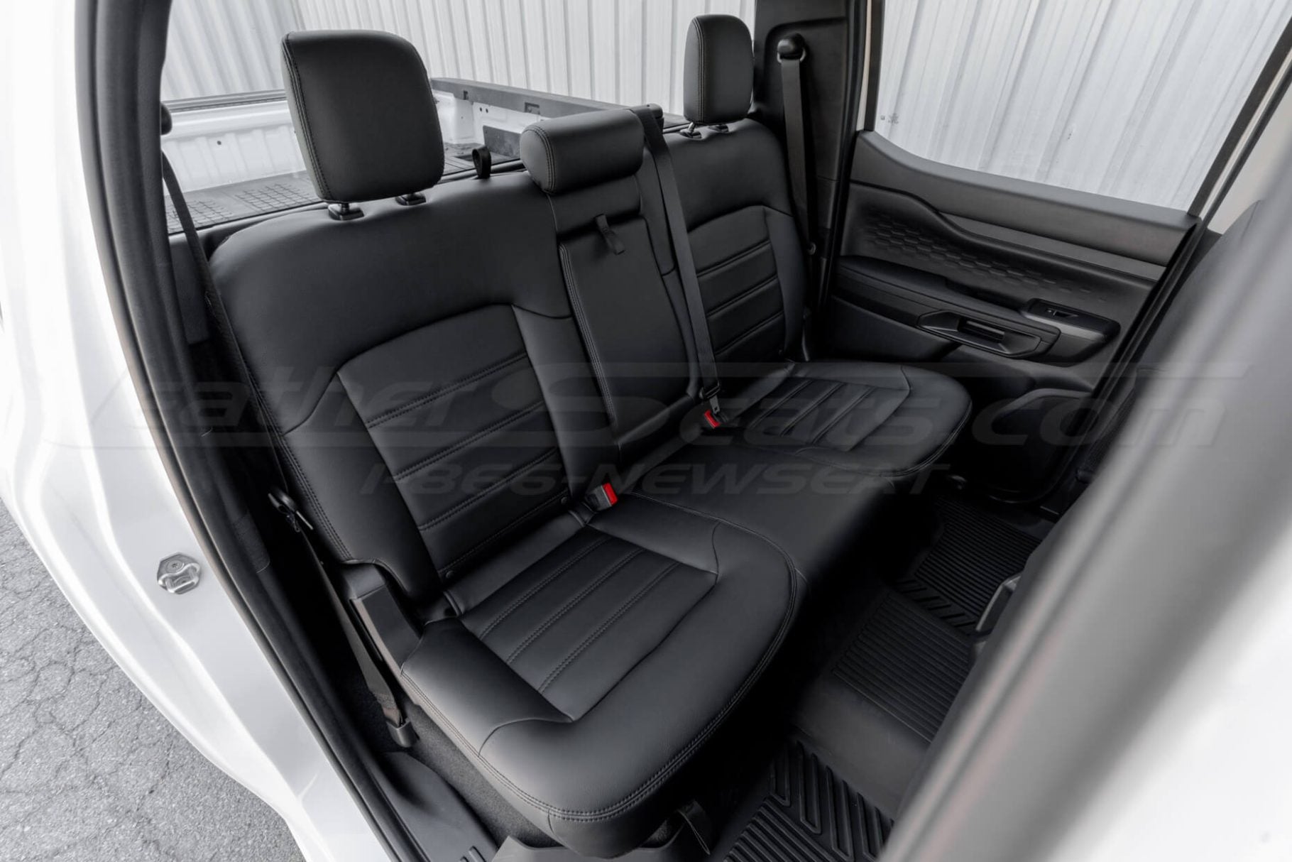 Ford Ranger with premium black leather seats installed - rear seats