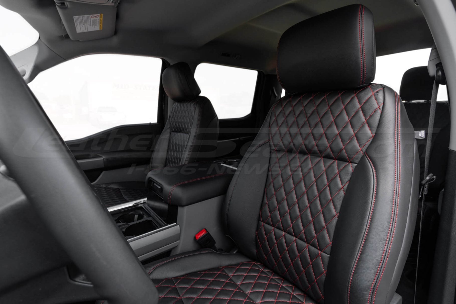 Backrest section of low back bucket seat with diamond quilting