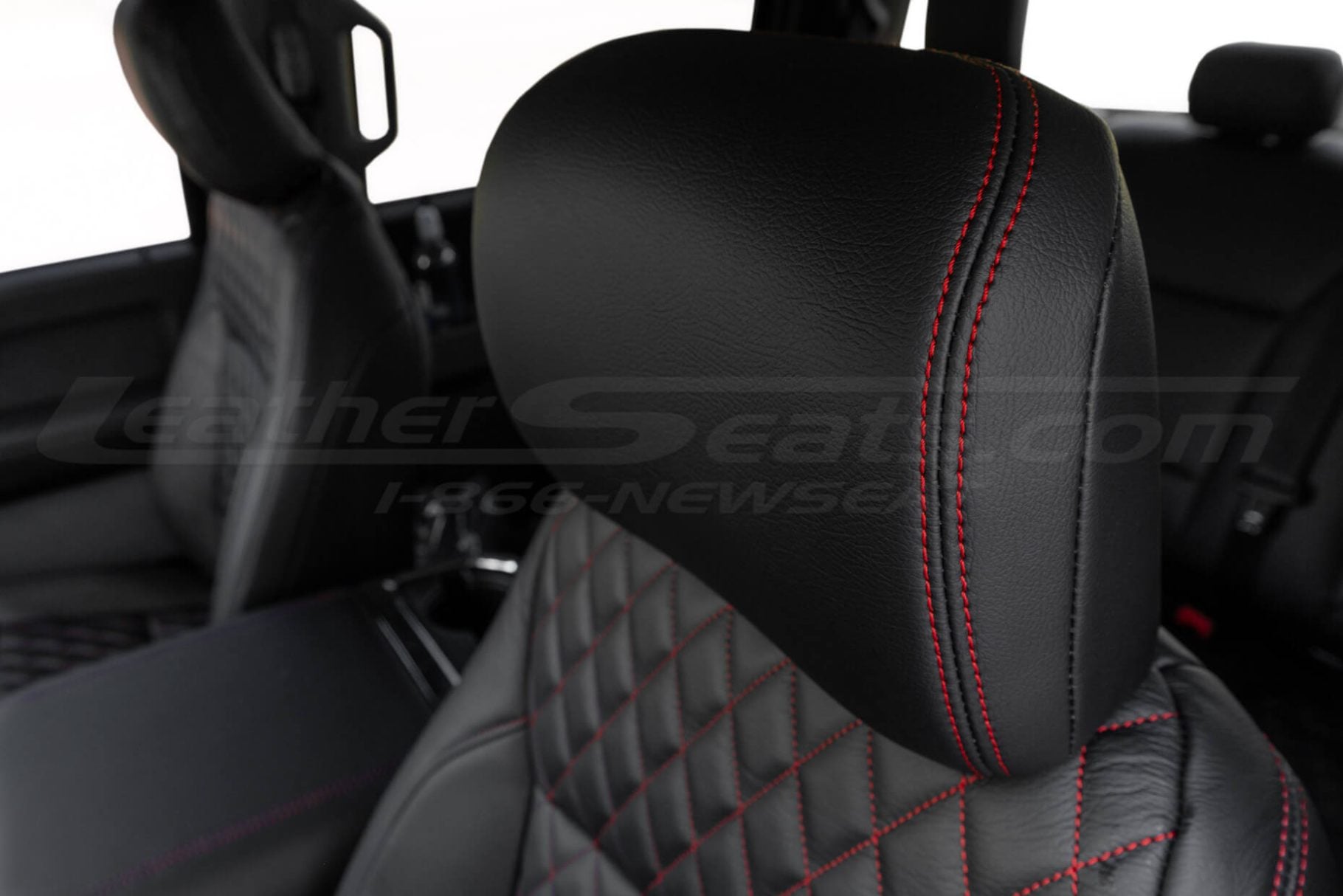Ford black leather headrest with contrast Red double-stitching