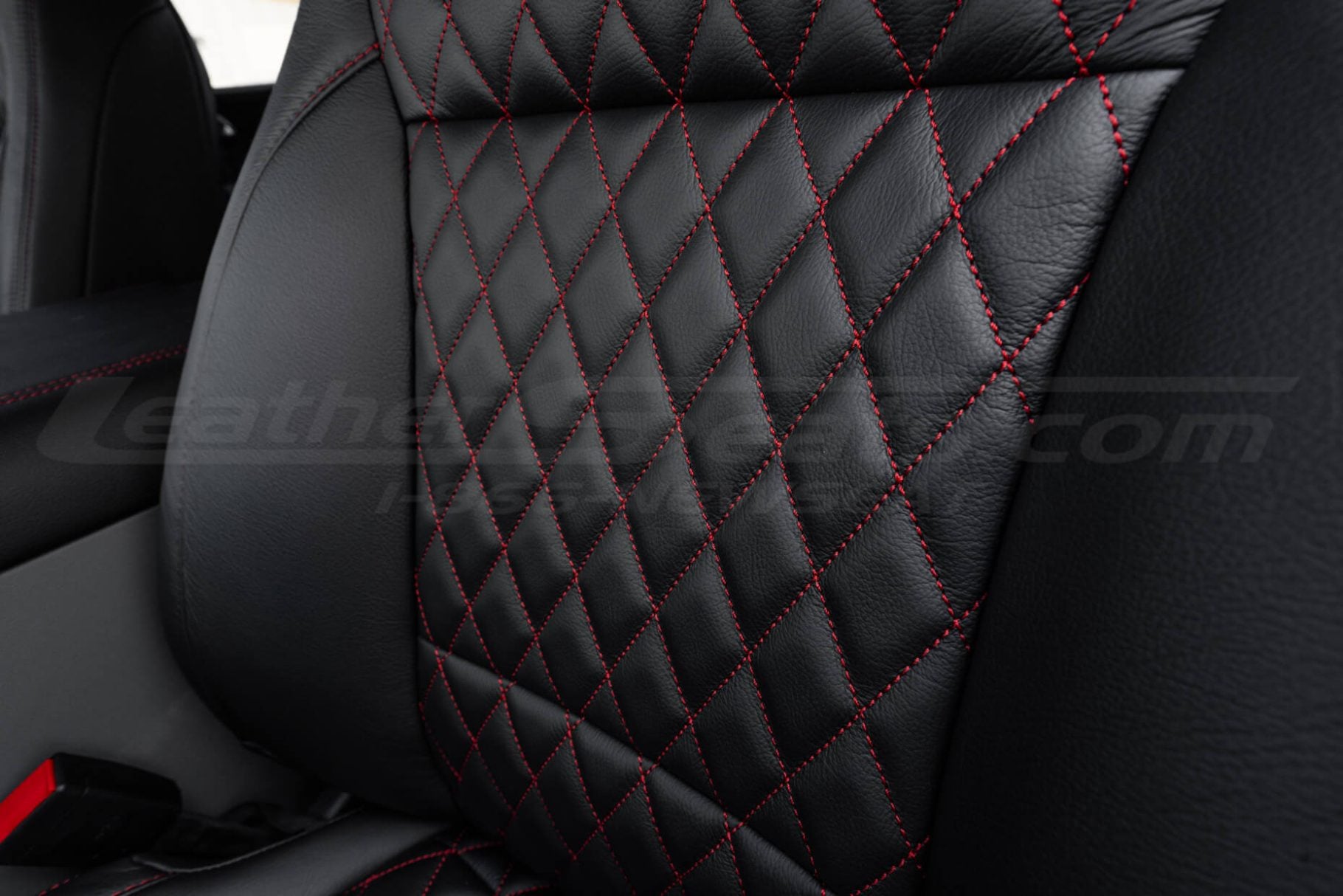 Diamond stitched leather seats. Diamond close-up