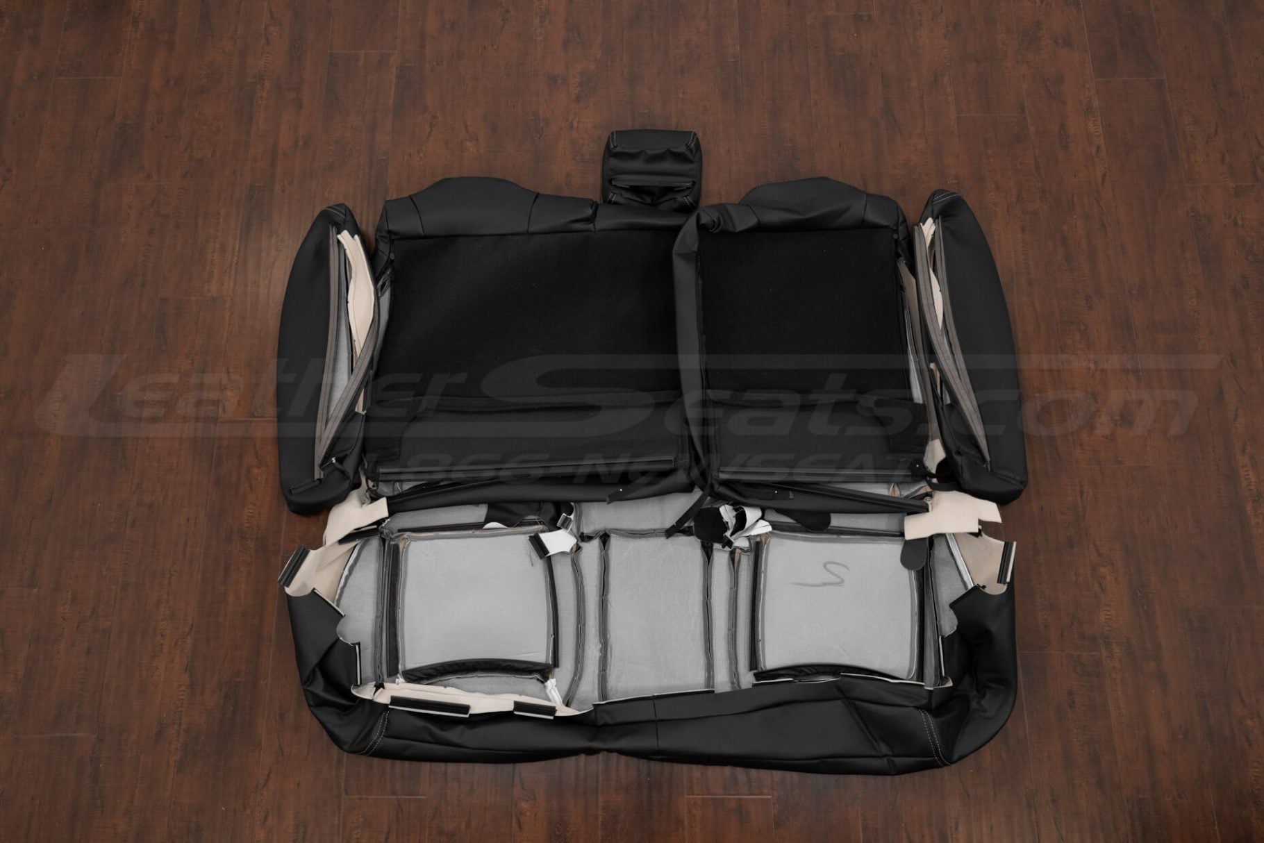 Rear seat 300C upholstery flipped showing carpet sections