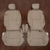Front seat leather upholstery kit for 2004–2009 Lexus RX 330, RX 350, and RX 400h in ivory/beige – includes driver and passenger seat covers with headrests and console pieces laid flat on wood flooring.