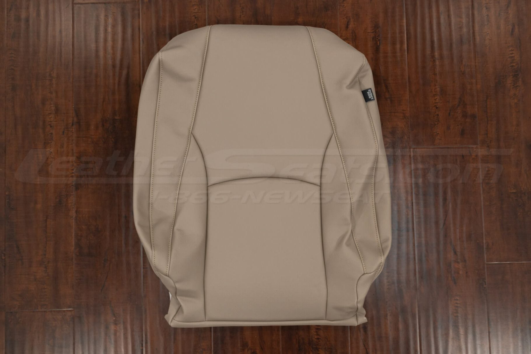 Ivory leather front seat backrest cover for Lexus RX series, shown laid flat to display contour lines, stitching detail, and OEM-style fit."