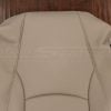 Close-up of Ivory leather front seat backrest cover for Lexus RX, showing fine grain texture, seam detail, and side airbag tag