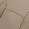Detailed view of Ivory leather texture and seam work on Lexus RX front seat backrest cover, highlighting grain variation
