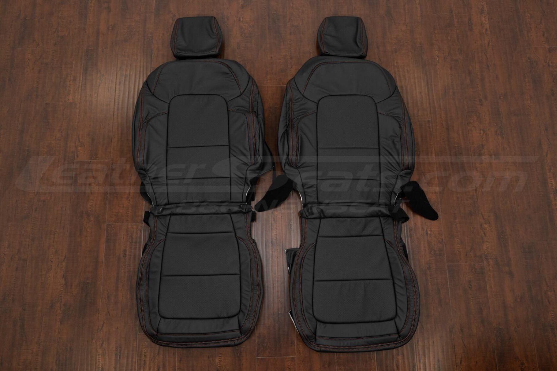 Custom Ford Bronco heritage leather seat covers in black with bright red double stitching