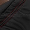 Contrasting Bright red double-stitching on Black leather