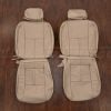 pair of front seat covers for 1999 Nissan Maxima in sandstone perforated leather — backrests and cushion covers shown together