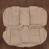 solid rear bench seat cover for 1999 Nissan Maxima — sandstone perforated leather with center insert and full-width design