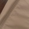 Sandstone double-stitching on matching sandstone leather