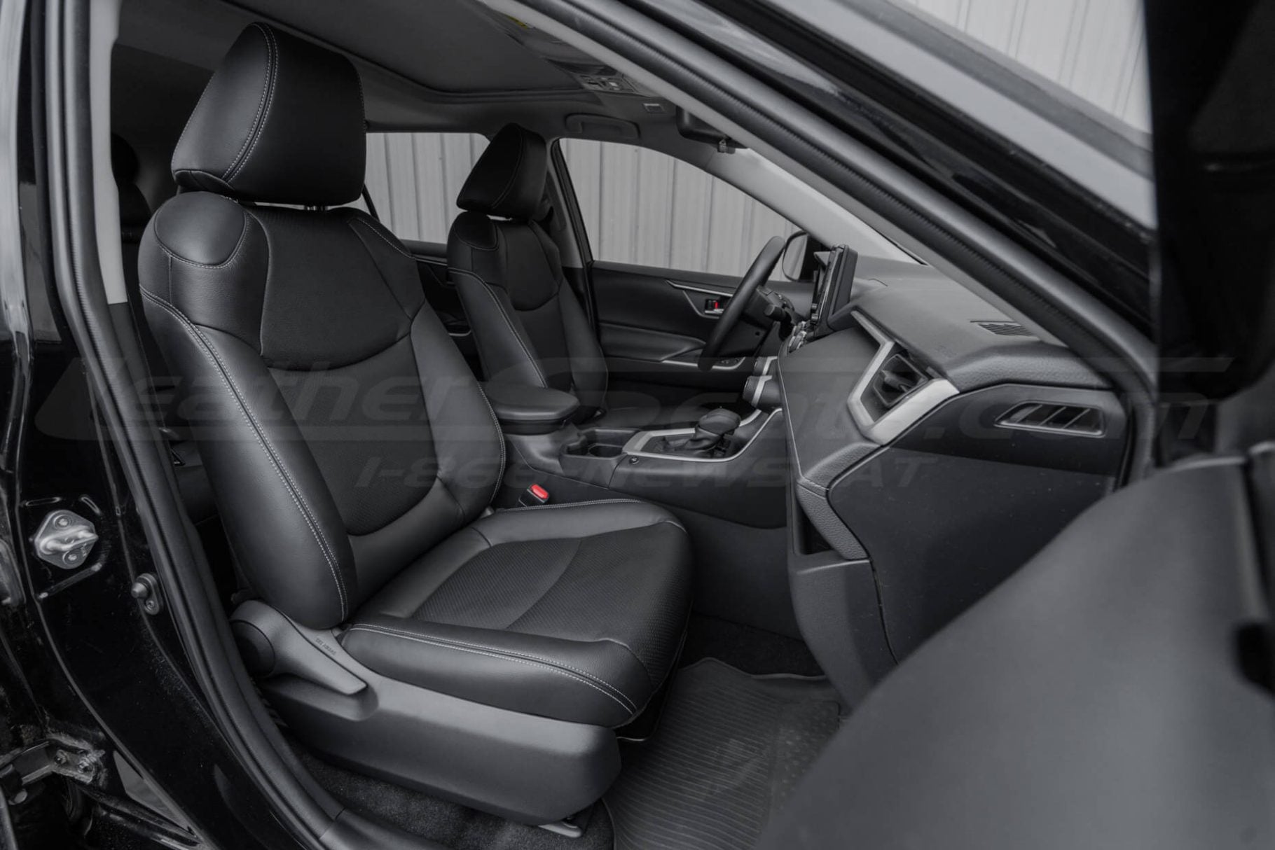 Aftermarket RAV4 seat covers installed - front passenger