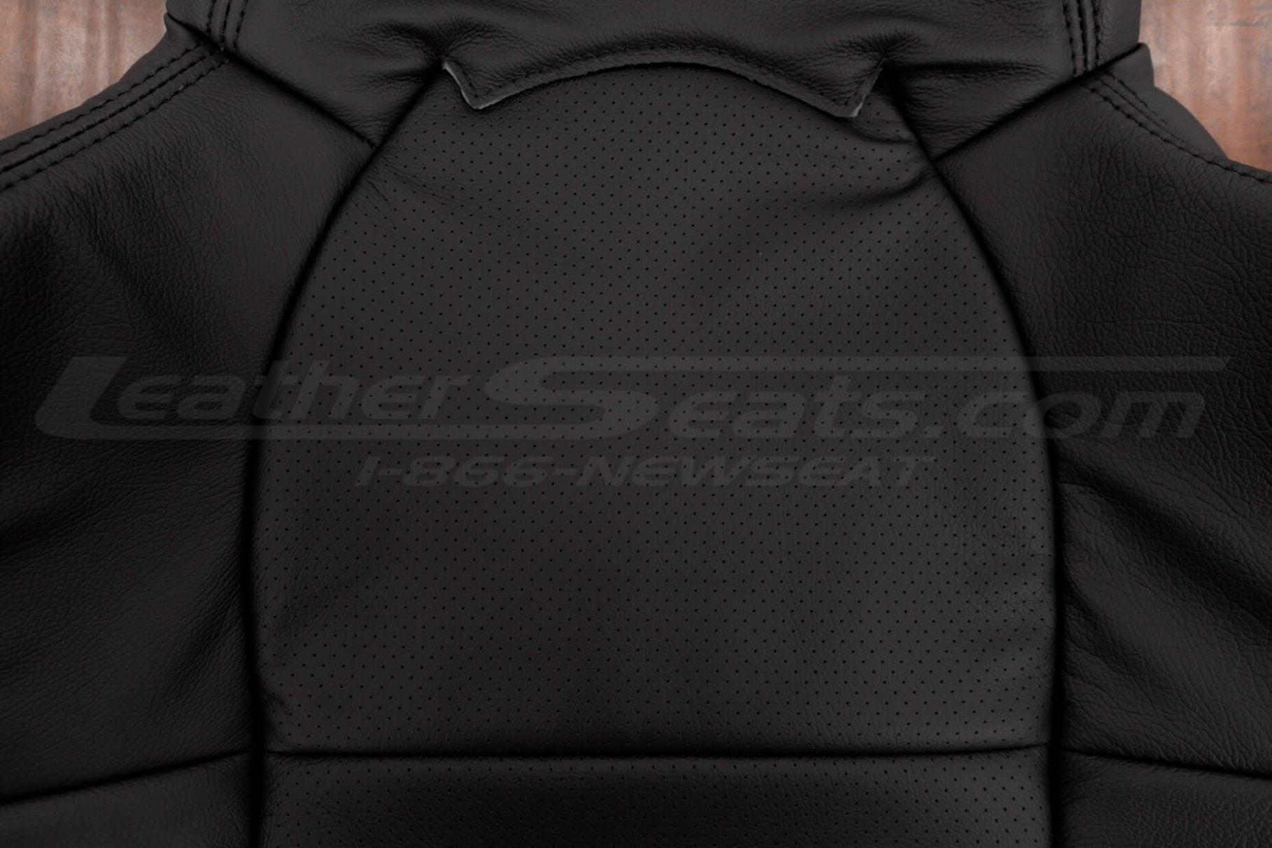 Black perforated leather on acura rsx backrest