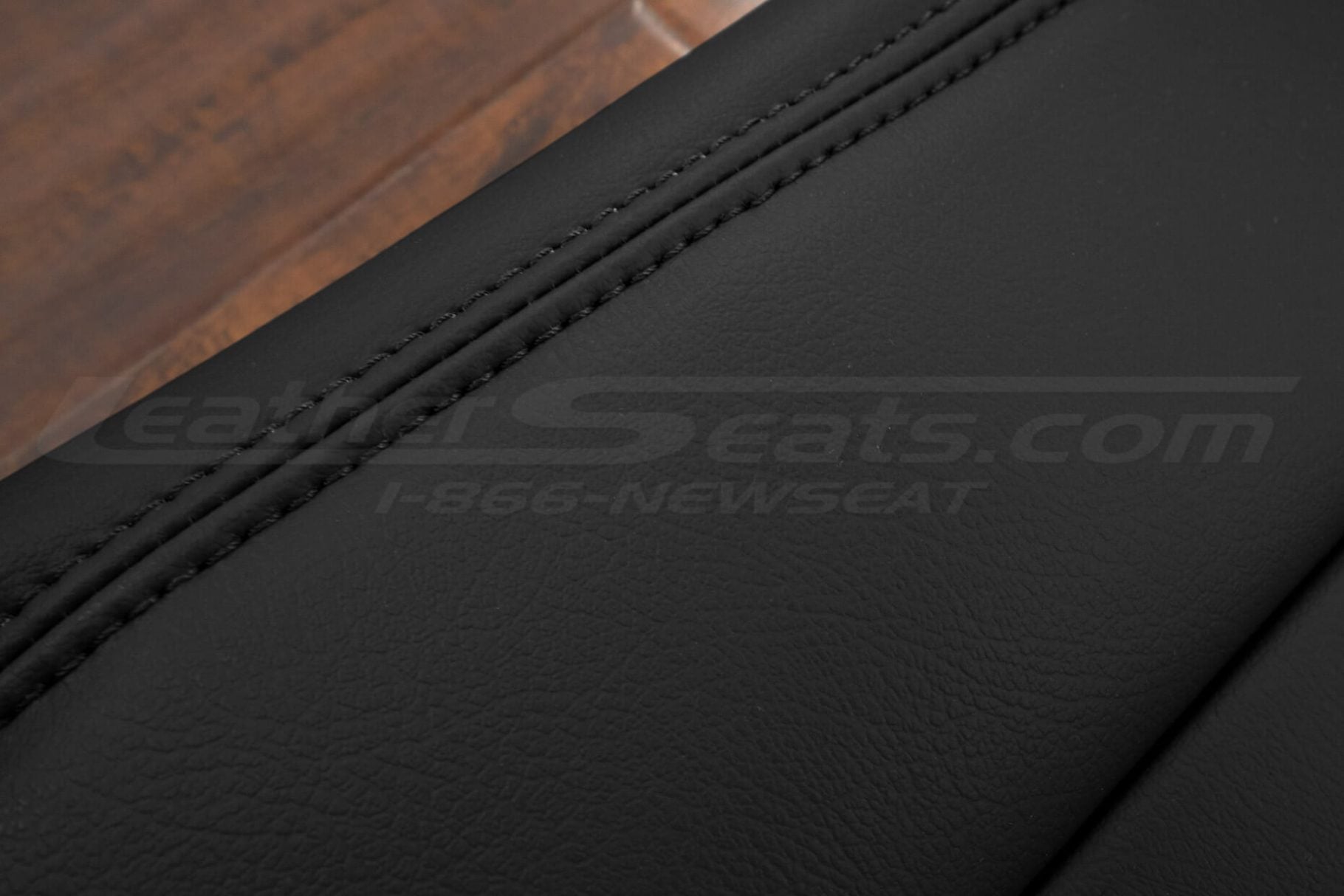 Black stitching on black leather -nc miata