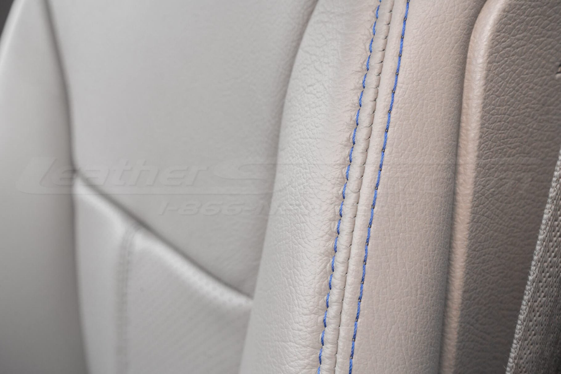 Close-up on contrasting Royal Blue stitching on Pddu leather