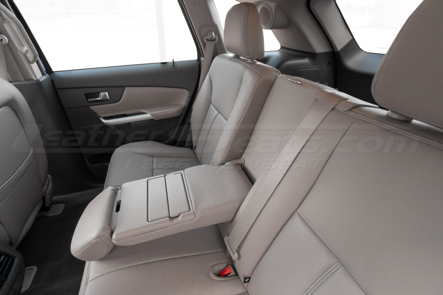 Rear seat ford edge center armrest fold down