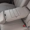 Folded down Ford Edge center armrest close-up