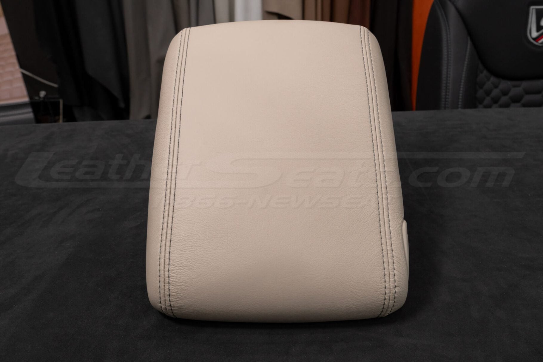 Head-on view of Cadillac Escalade leather console lid