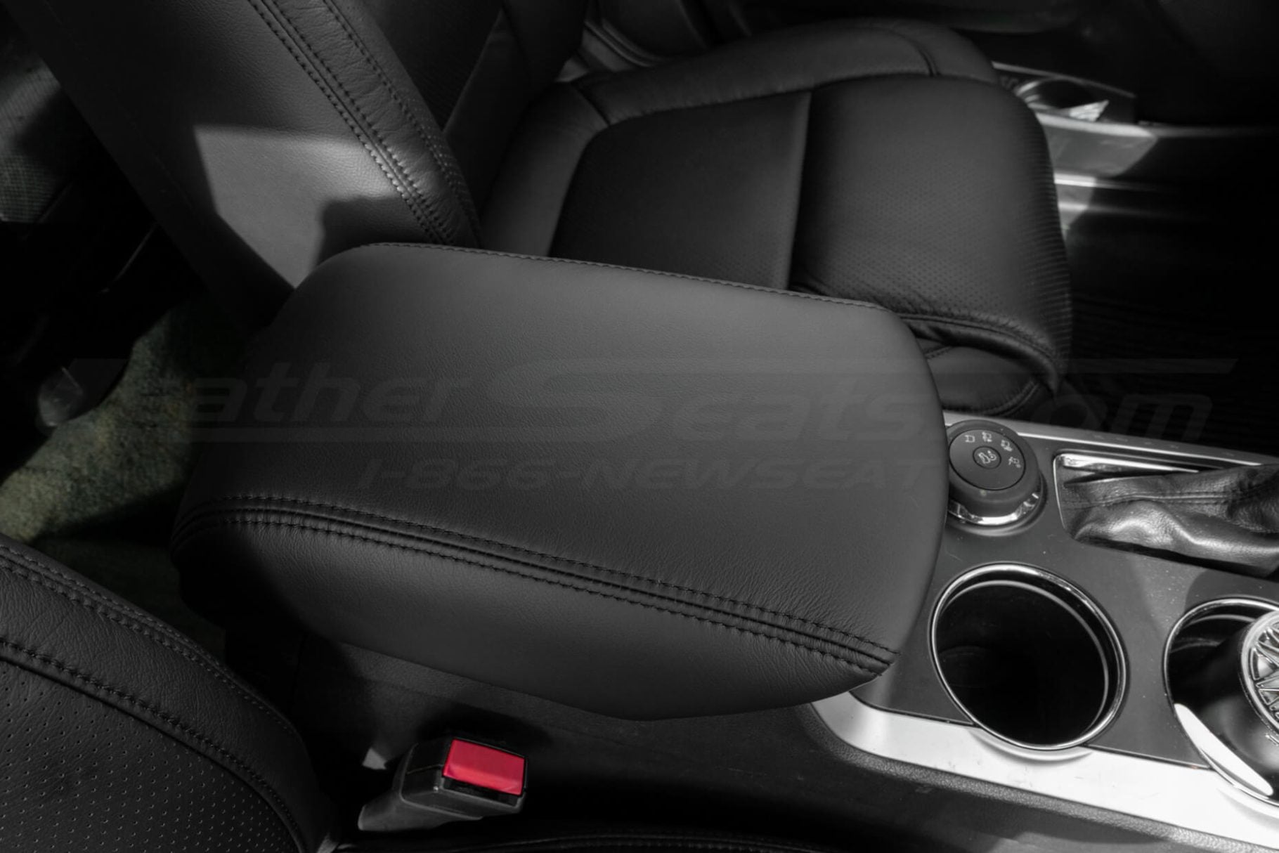 close-up passenger view of black leather console lid upholstery for ford explorer